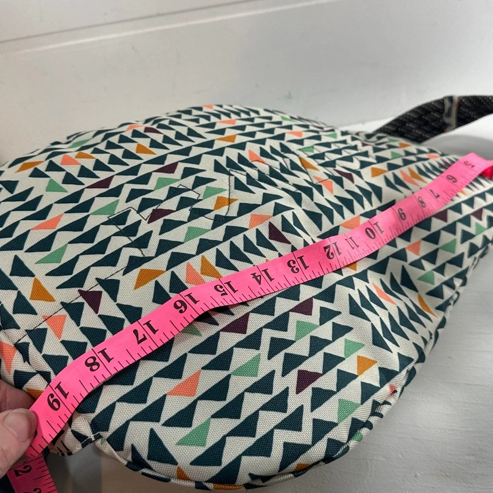 Kavu Geometric Triangle Sling Backpack in Cream, Black, Orange, Green, Navy